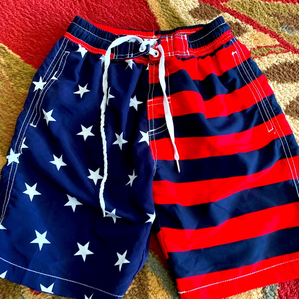 Kute ‘N Koo boys swimming trunks size Large.